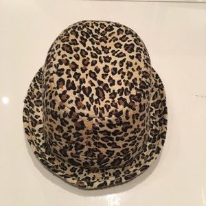 Twirl & Co kids leopard print fashion hat. The print is tan,brown and black. S/M